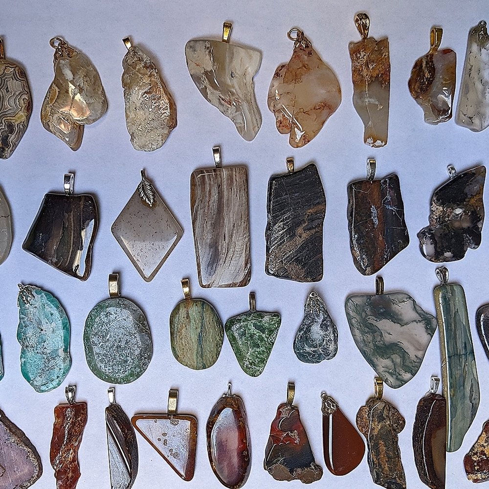 Mixed material and petrified wood pendants